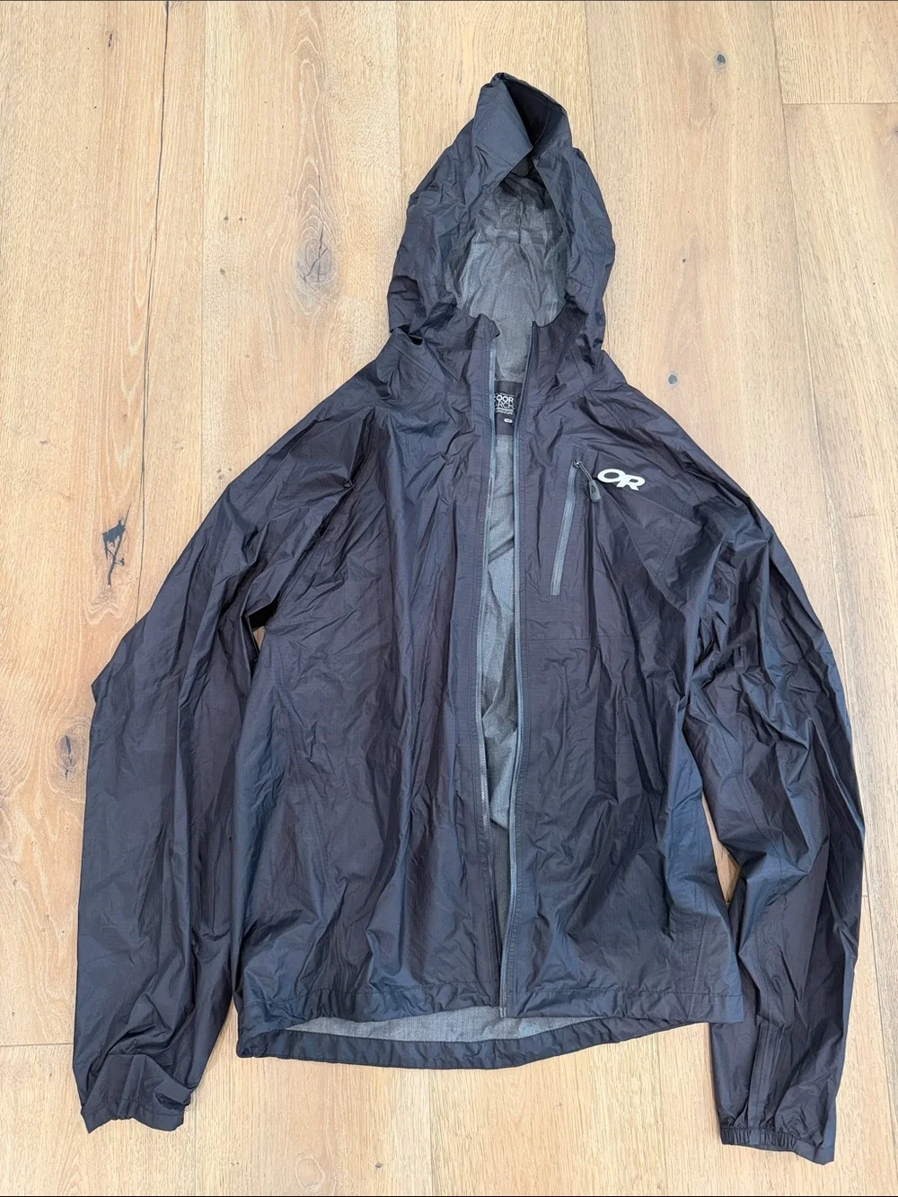 Outdoor Research Black Hooded Packable Rain Shell. Rain jacket. Size small